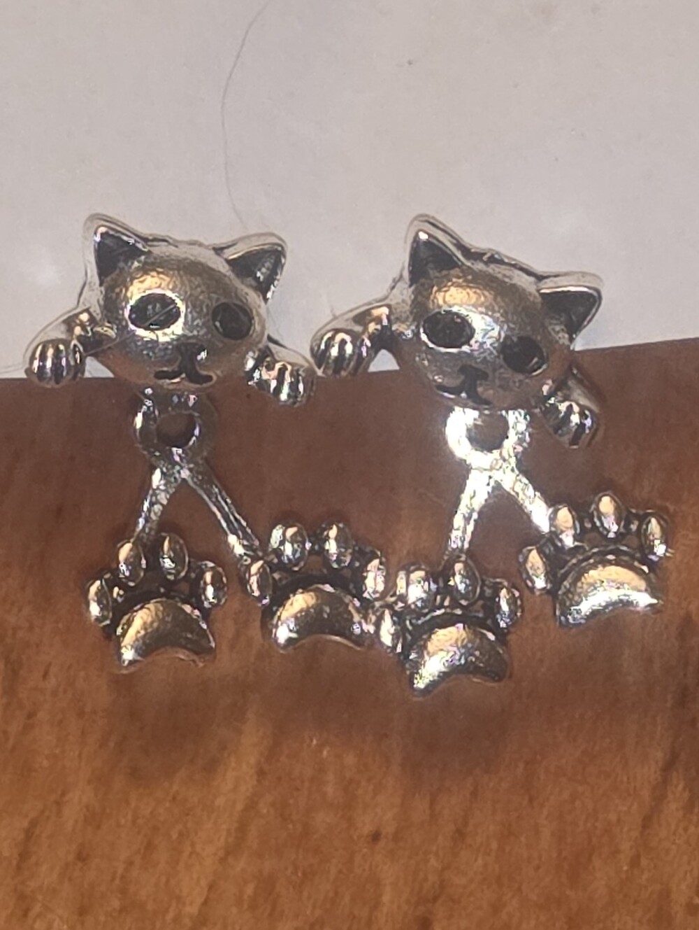 Little Silver Tone Cat Earrings With Dangling Feet